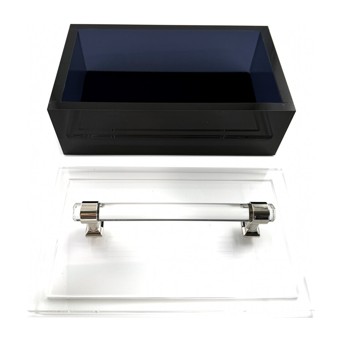 Black acrylic box base beside its clear lid with silver handle