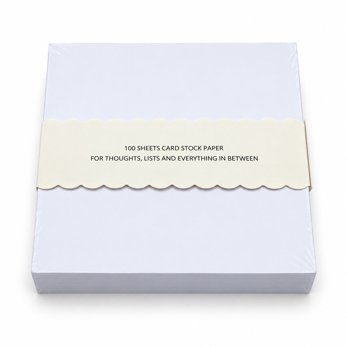 Back of a 5x5 notepad in cello wrap with a scalloped band reading 100 sheets card stock paper, for thoughts, lists and everything in between