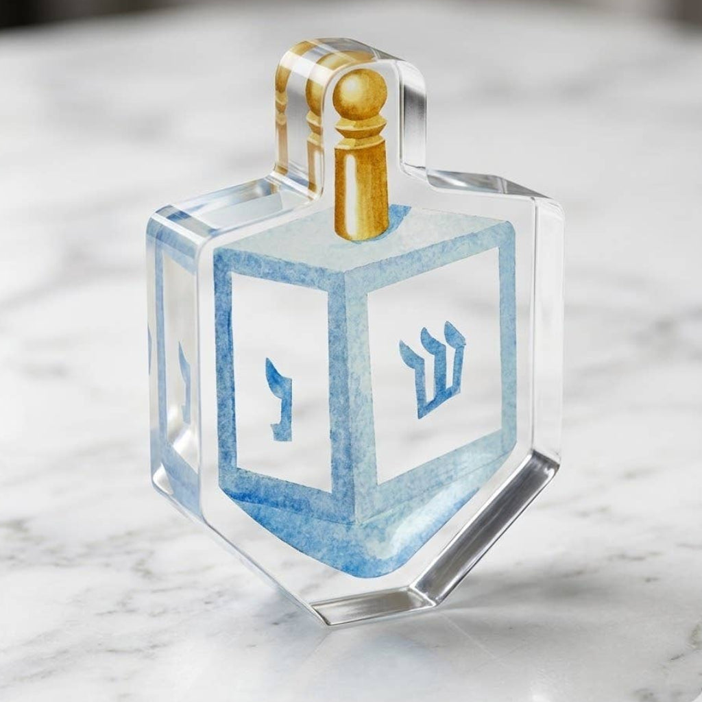 Dreidel acrylic napkin weight, styled photo