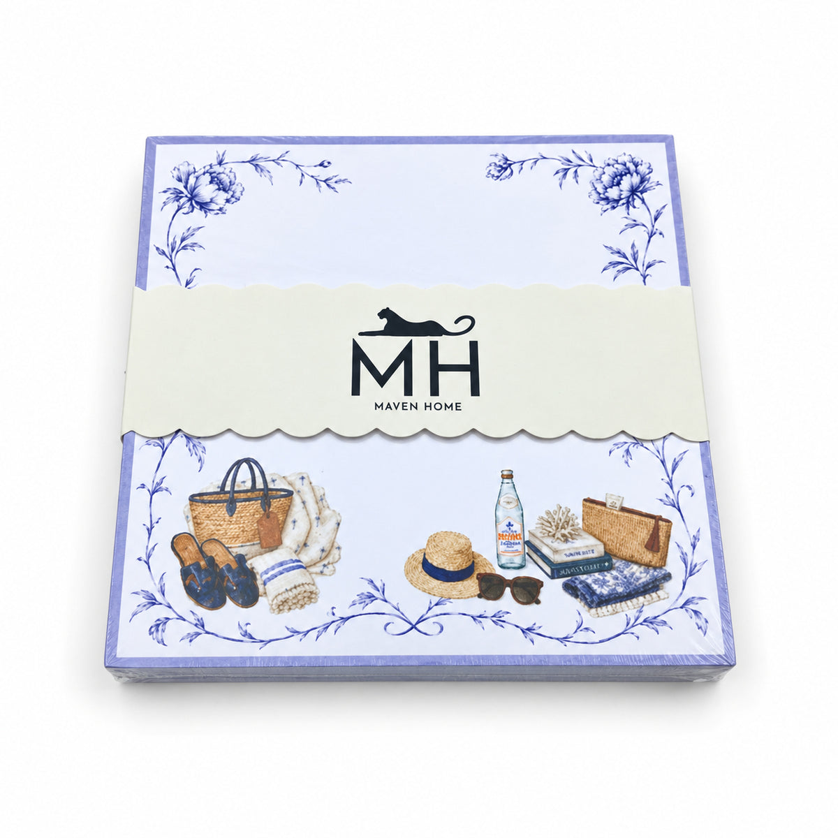 Proper Beach Club 5x5 notepad wrapped in its scalloped MH band, with a lavender border, blue florals and a straw tote
