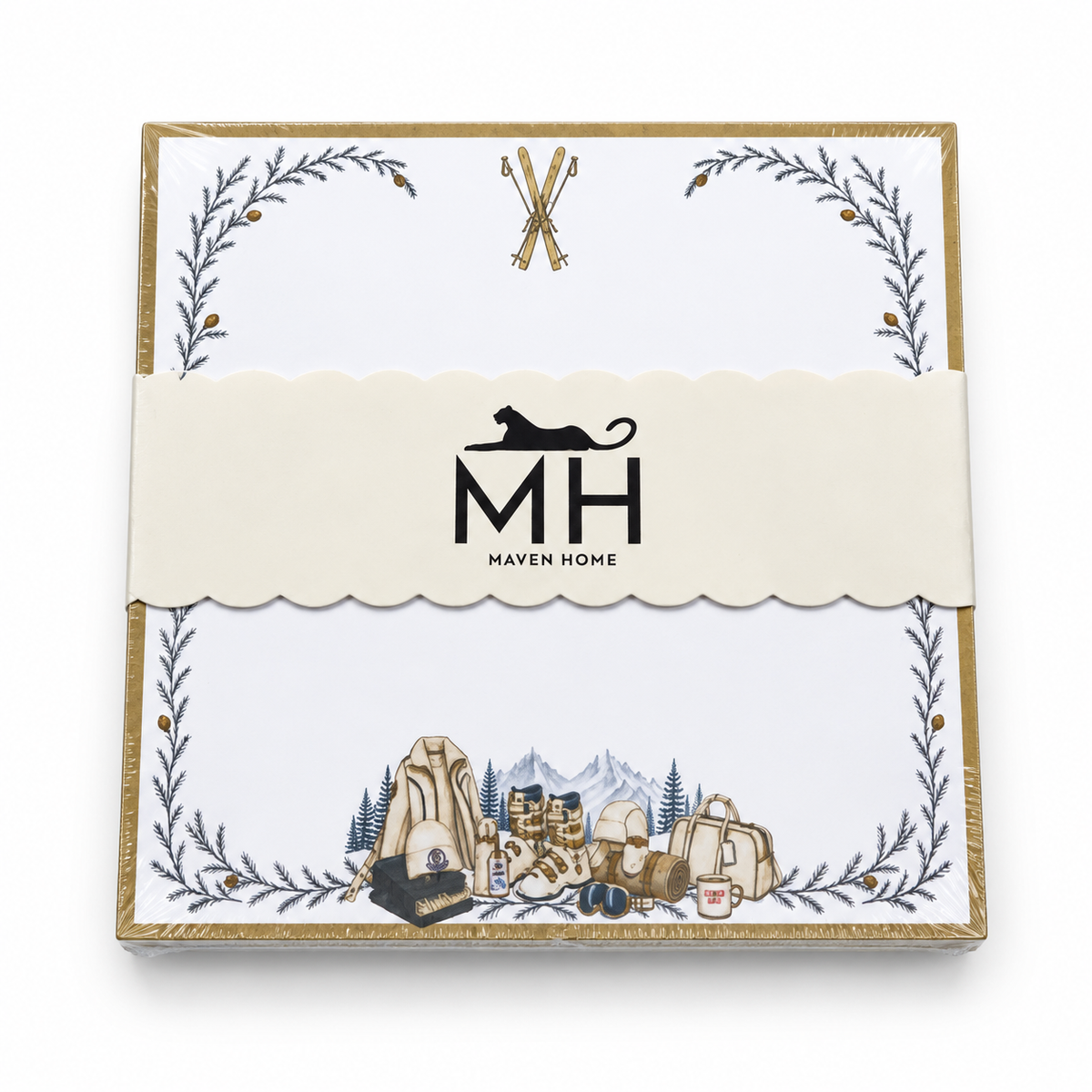 Proper Ski notepad in its MH band with crossed skis, a gold border, pine branches and ski gear
