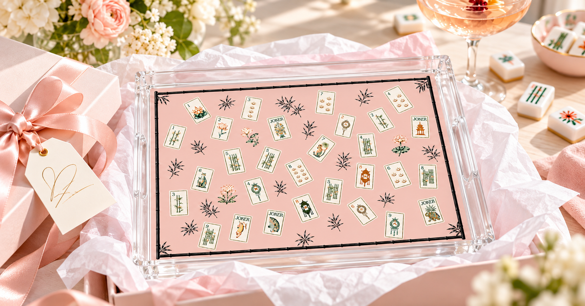 Mahjong Pink Lotus acrylic vanity tray in a pink gift box with tissue paper and ribbon