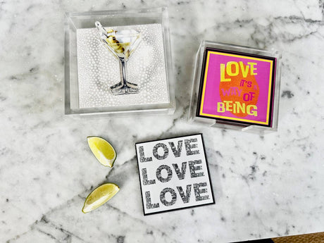 Martini acrylic napkin weight on marble with lime wedges