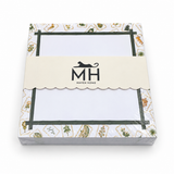 Bamboo Lotus Mahjong notepad in its MH band with a green bamboo frame and a border of illustrated mahjong tiles