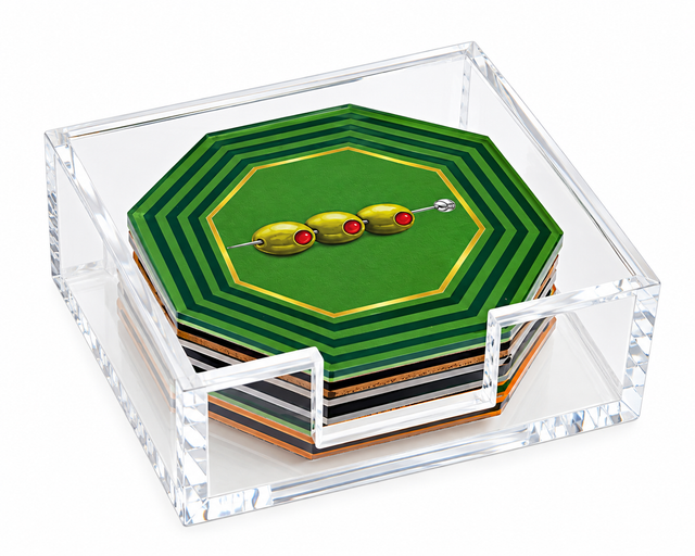 Green olive coaster on top of the octagonal coaster set in a clear acrylic holder, angled view