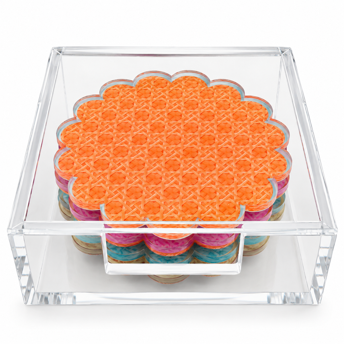 Orange cane coaster on top of a scalloped stack in a clear acrylic holder, front view