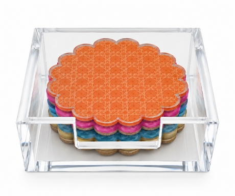 Cabana coasters stacked in a clear acrylic holder showing orange, pink, blue and sand layers with cork backs