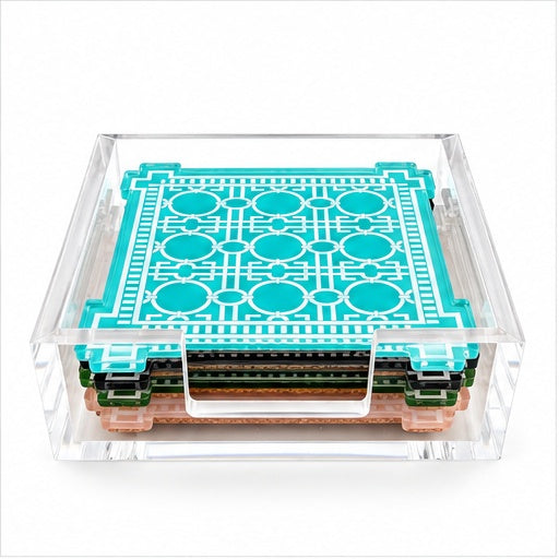 Aqua trellis coaster on top of a stack of four in a clear acrylic holder, front view