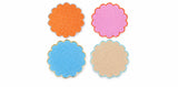 Cabana set of four scalloped acrylic coasters in orange, pink, blue and sand, laid flat
