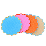 Cabana coasters fanned in a stack, showing blue, pink, orange and sand woven patterns