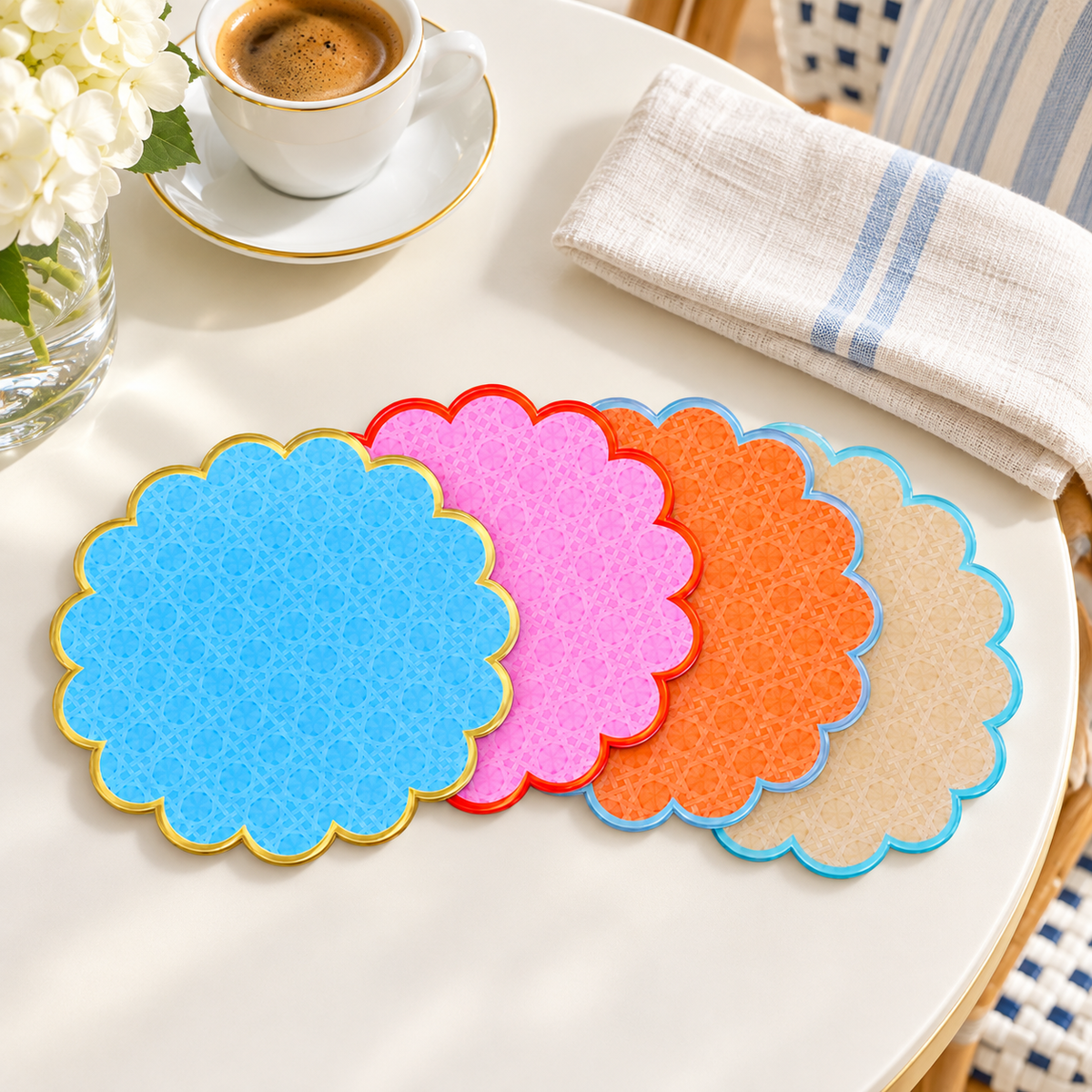 Cabana coasters fanned beside an espresso cup in a sunny breakfast nook