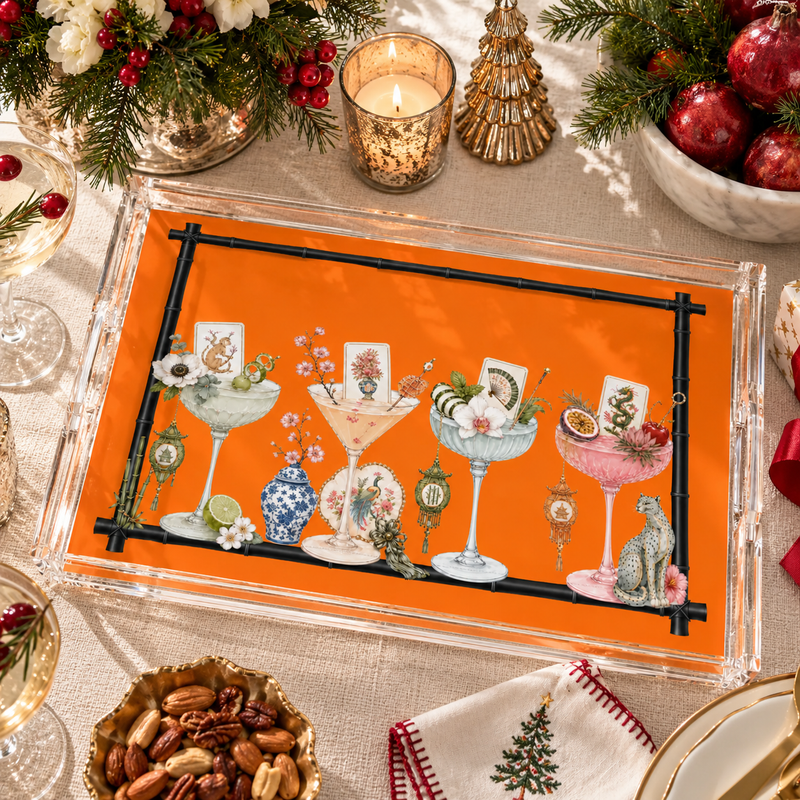 Maven Home acrylic serving tray styled for a Christmas mahjong game night with cocktails, playing cards and holiday ornaments
