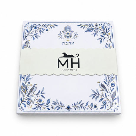 Hamsa and Ahava 5x5 notepad wrapped in its scalloped MH band, with blue vines, birds and evil eyes