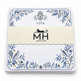 Angled view of the wrapped Hamsa and Ahava notepad with Hebrew Ahava and a gold hamsa