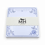 Notes, Goals and Other Good Ideas 5x5 notepad wrapped in its scalloped MH band, with blue butterflies and a peony