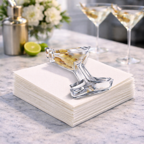 Martini acrylic napkin weight: a classic martini glass with three skewered olives, drawn in fine black lines