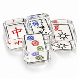 Mahjong acrylic napkin weight on white, a cluster of mahjong tiles including red dragon, plum blossom and circle tiles