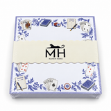 Proper Canasta notepad in its MH band with playing cards, canasta score pads, chips and blue florals