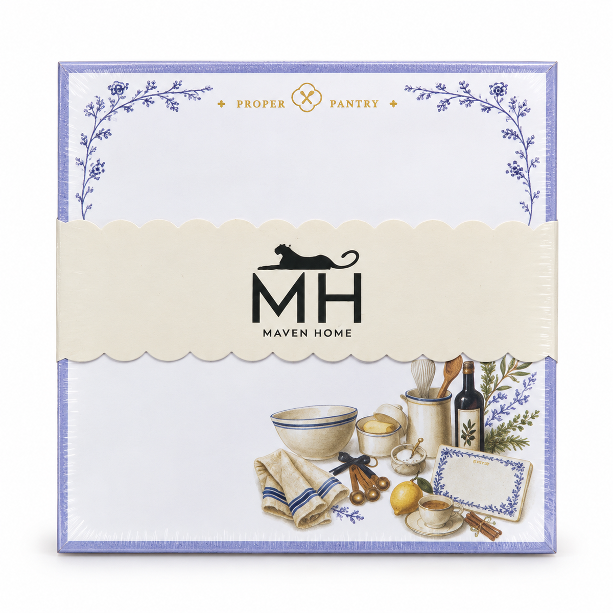 Proper Pantry notepad in its MH band with a mixing bowl, olive oil, lemon and recipe card