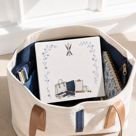 Proper Teacher notepad in a canvas teacher tote with pens and a floral notebook