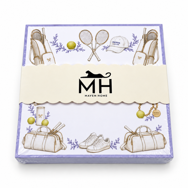 Proper Tennis notepad in its MH band with a lavender border, crossed rackets, tennis bags and balls