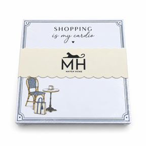 Shopping Is My Cardio notepad in its MH band with a cafe chair, bistro table and tote