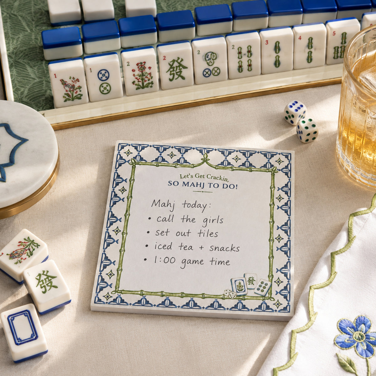 So Mahj to Do! notepad with a handwritten mahjong day list beside a tile rack and dice