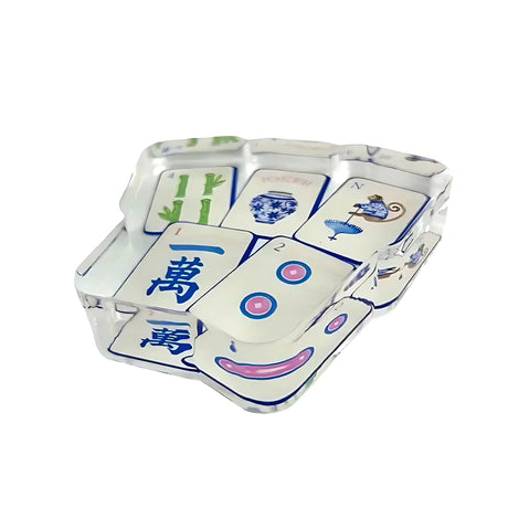Preppy Mahjong acrylic napkin weight, angled close-up on white